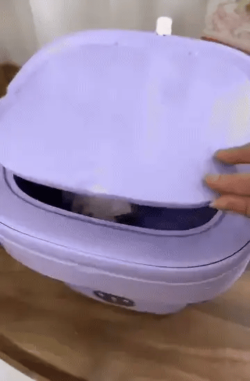 "Foldable Mini Laundry Machine – Clean Clothes Anywhere"